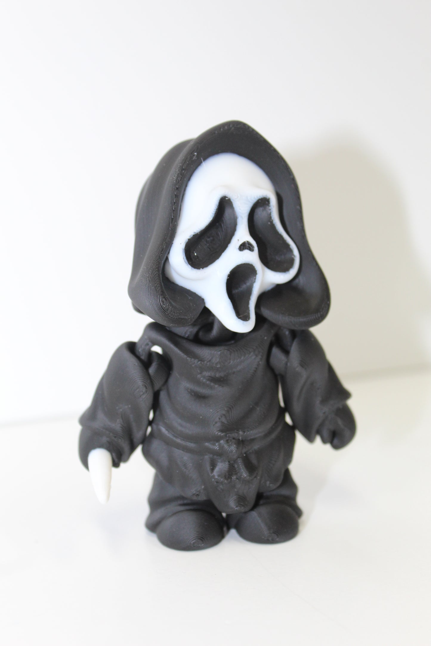 Flexi Ghost Face Figure