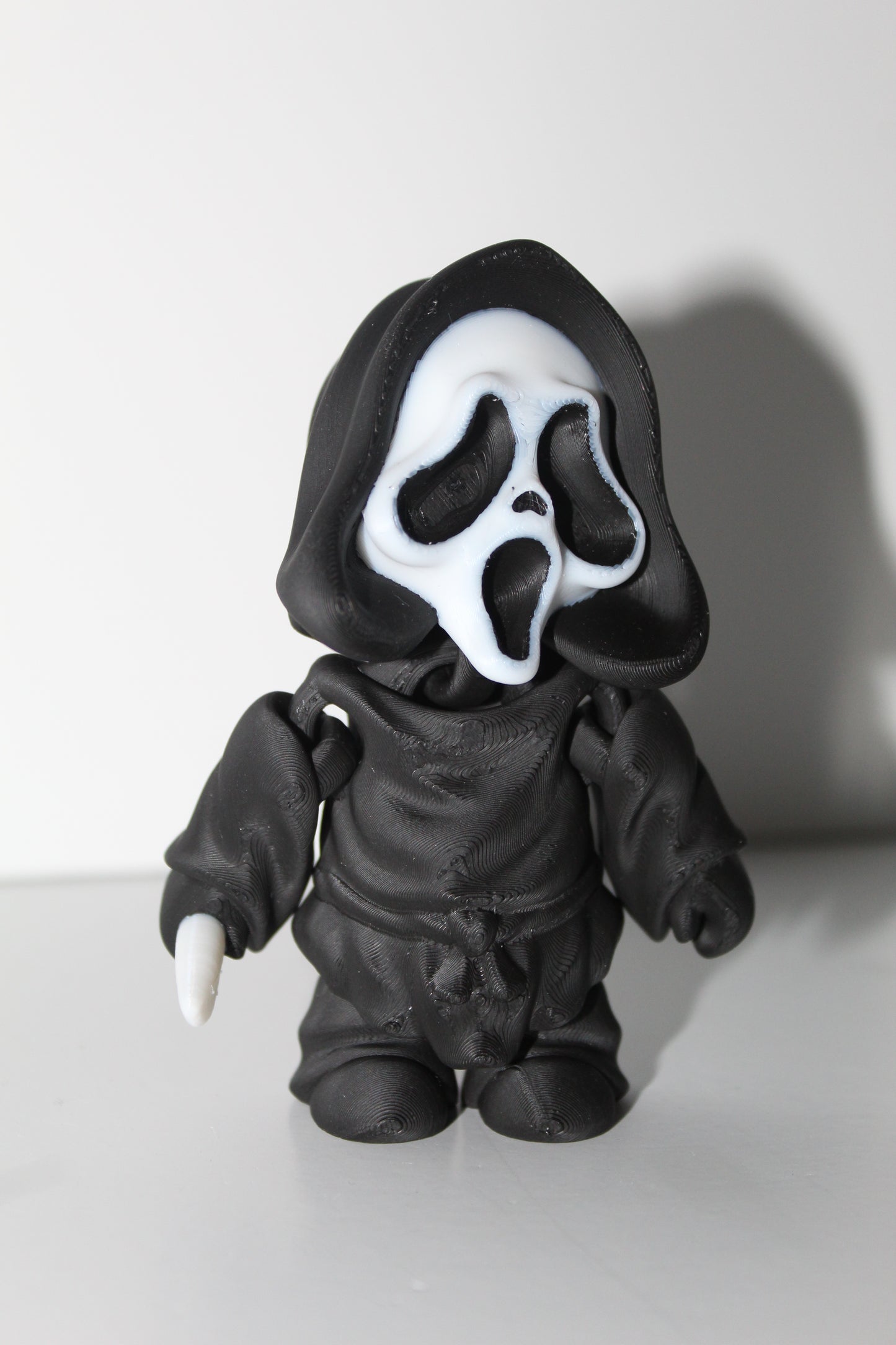 Flexi Ghost Face Figure