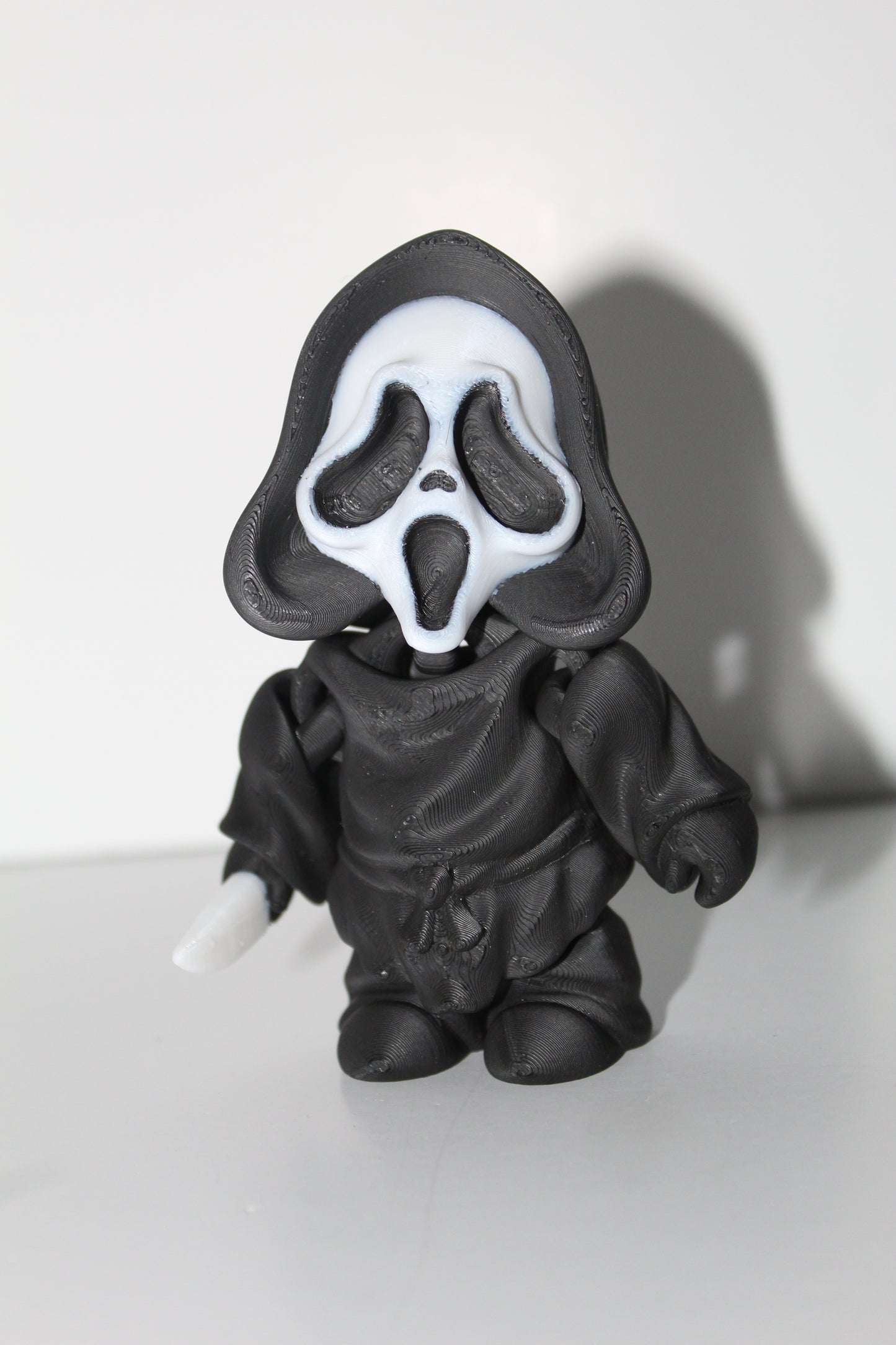 Flexi Ghost Face Figure