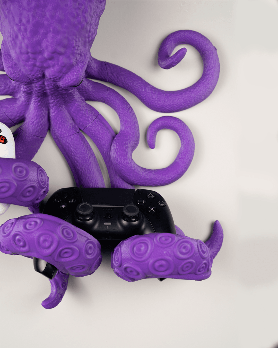 Octopus controller and headphone holder